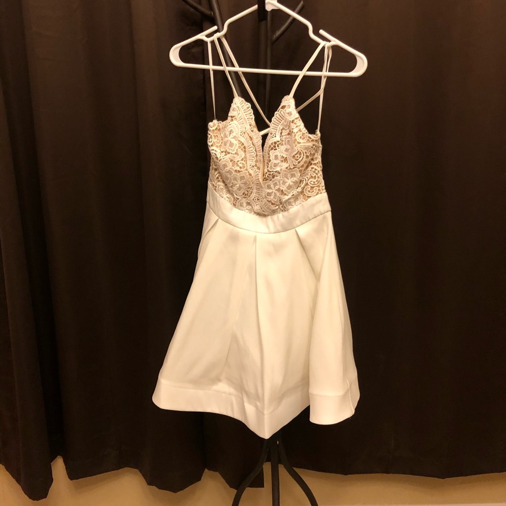 Beautiful laced v neck top connected with skirt